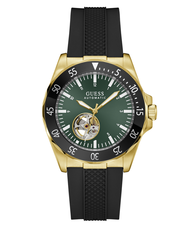 A Guess Automatic watch with a gold-tone case, dark green dial, black bezel, and black textured strap, shown against a plain white background.