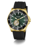 A GUESS Automatic watch with a gold-tone case, black textured strap, and a dark green dial featuring a skeletonized sub-dial showing the inner movement.