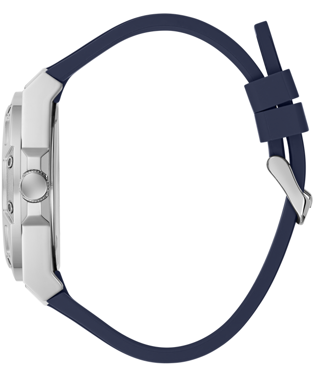 Close-up side view of a watch with a silver-toned metal case and a dark navy blue silicone strap on a plain white background.