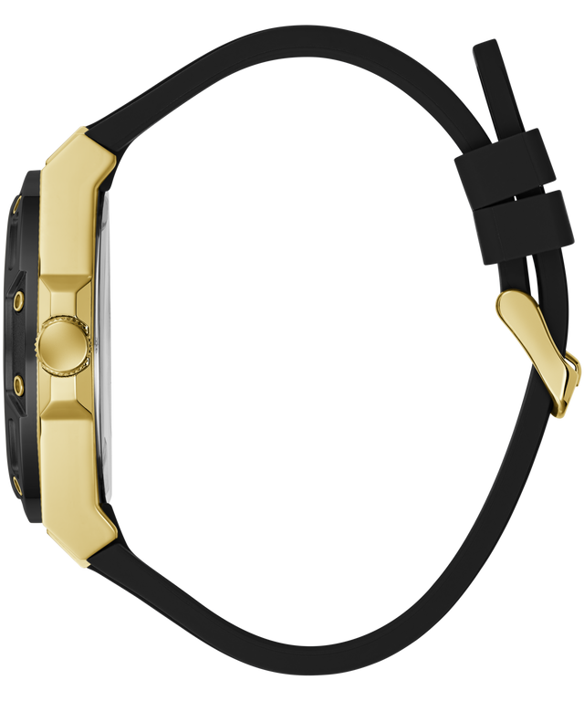 A close-up side profile of a watch with a gold-tone geometric case and a black silicone strap, shown on a plain white background.