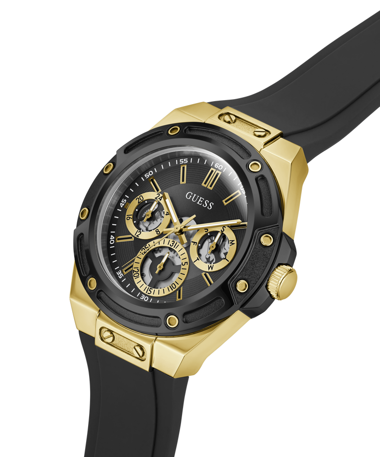 A Guess men's chronograph watch featuring a black and gold-tone case, a black dial with gold subdials and markers, and a black rubber strap, shown on a solid white background. lifestyle