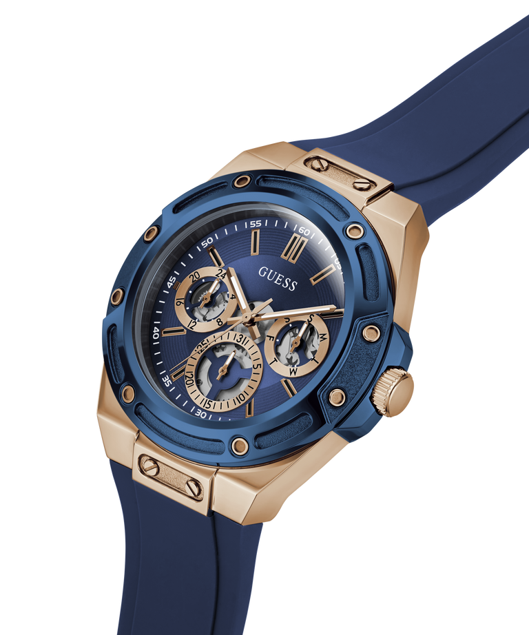 A Guess wristwatch with a blue dial, blue bezel, rose gold case, and blue strap, shown on a clean white background. lifestyle