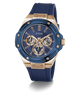 A GUESS men's chronograph watch featuring a blue bezel and blue silicone strap, paired with a rose gold-tone case and a blue dial with gold-tone subdials.