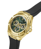 A gold-tone Guess wristwatch with a dark green dial, featuring three subdials and a black rubber strap, shown on a clean white background. lifestyle