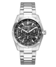A Guess men's stainless steel watch with a silver-tone metal link bracelet, featuring a black and gray textured dial with three subdials and a tachymeter bezel.
