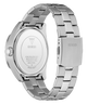 Silver stainless steel wristwatch shown from the back, featuring a matching metal link bracelet, a crown knob on the left, and the GUESS brand name and logo visible on the back case and clasp.