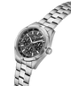 A Guess men's stainless steel analog watch with a silver-tone metal link bracelet and a dark gray dial featuring three subdials. lifestyle