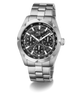 A GUESS men's stainless steel chronograph watch with a black textured dial, featuring three sub-dials, a faceted bezel, and a matching steel link bracelet, shown on a white background.