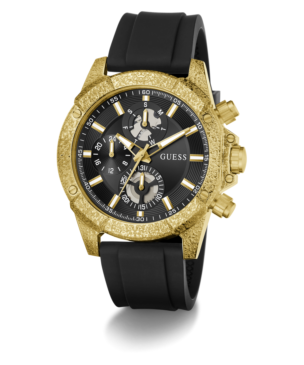 A Guess men's chronograph watch featuring a textured gold-tone case, a black dial with gold-tone subdials and markers, and a black rubber strap, shown on a white background with a soft shadow.