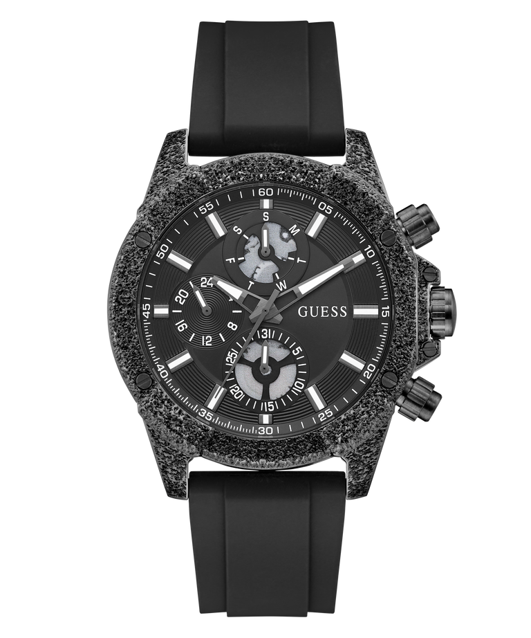 A GUESS chronograph watch with a textured dark gray and black case, a black dial with white markings, and a black silicone strap, shown against a plain white background.