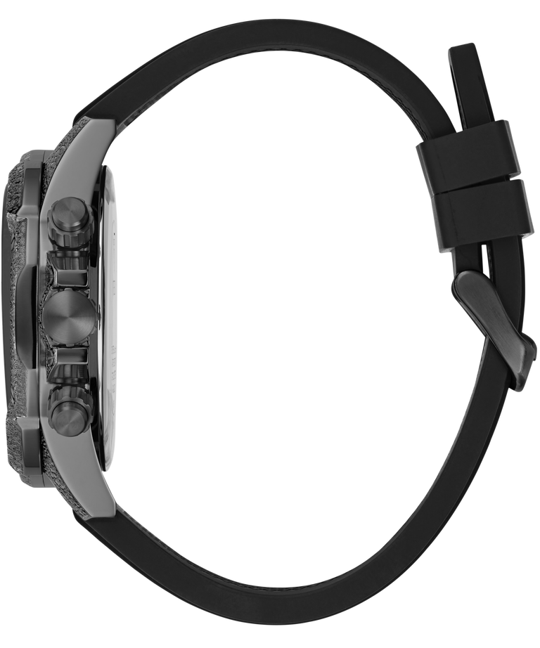 A close-up side view of a watch with a textured dark gray case, a black rubber strap, and a black magnetic clasp, shown against a plain white background.