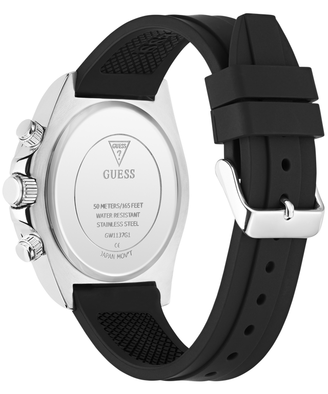The back view of a GUESS watch with a silver stainless steel case and a black silicone strap, shown on a white background.