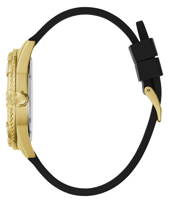 A luxury watch shown in a side profile view, featuring a highly detailed gold-toned case and a black silicone strap with a gold-toned clasp, set against a solid white background.