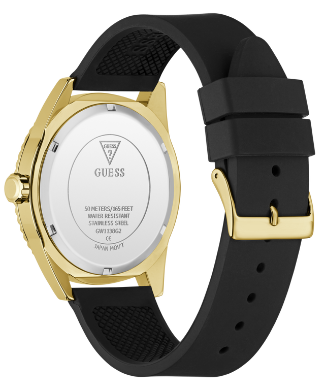 Back view of a GUESS watch with a gold-tone case and a black silicone strap, on a clean white background.