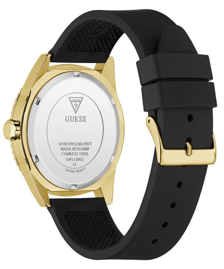 Back view of a GUESS watch with a gold-tone case and a black silicone strap, on a clean white background.