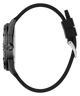 A side profile view of a black smartwatch with a textured dark bezel and a matching black silicone strap featuring a silver-toned clasp, set against a solid white background.