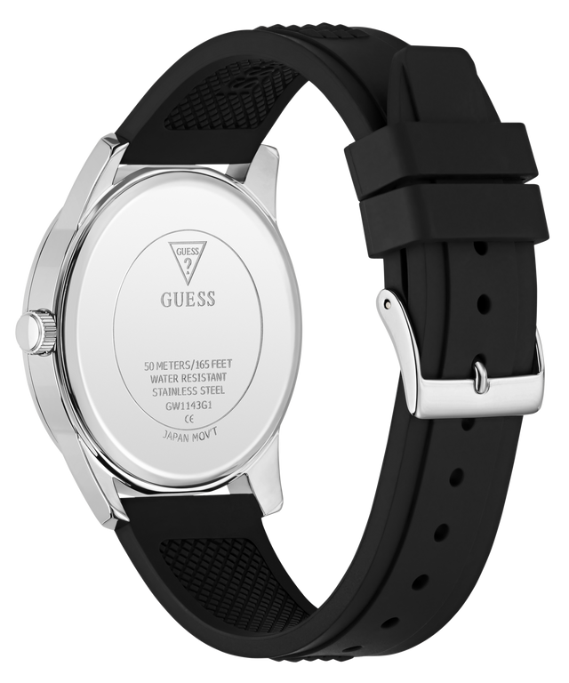The back of a GUESS watch with a silver stainless steel case and a black textured silicone strap, shown on a white background.