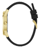 Side profile of a watch with a gold-tone case and a black textured silicone strap, shown on a plain white background.