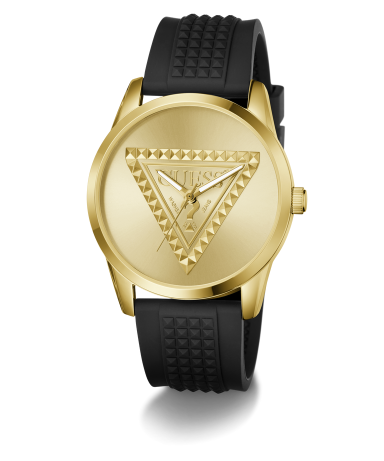 A Guess women's analog watch featuring a gold-tone round case, a gold-tone dial with an embossed triangle logo, and a textured black silicone strap.