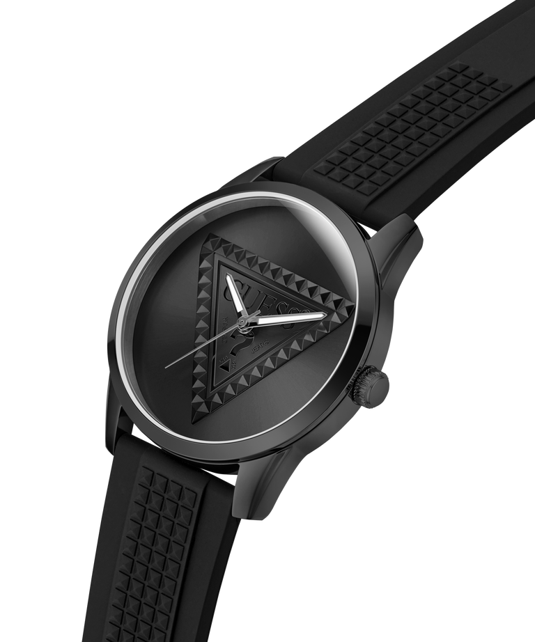 A black analog watch with a textured strap and a geometric pyramid dial design, shown on a clean white background. lifestyle