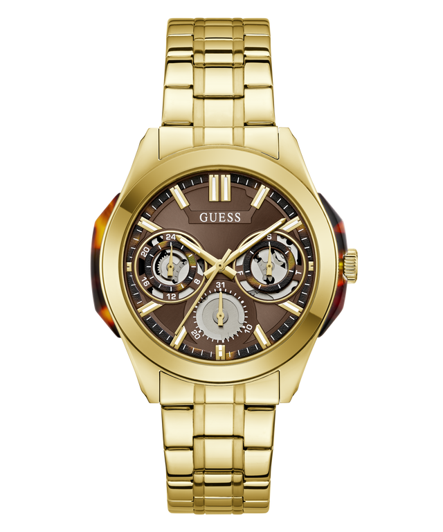 A gold-tone stainless steel wrist watch with a brown dial, featuring three sub-dials, gold-tone hour markers, and a matching gold-tone link bracelet. The brand name 'GUESS' is clearly visible on the dial.