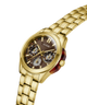 Gold-tone Guess wristwatch with a multi-dial brown dial and matching gold-tone metal link bracelet, shown on a clean white background. lifestyle