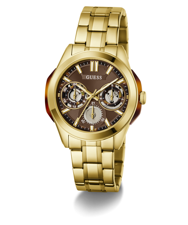 Gold-tone stainless steel wristwatch with a brown dial, featuring three subdials, gold-tone hour markers, and a matching gold-tone link bracelet. The GUESS brand name is visible on the dial.