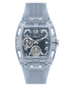 A GUESS wristwatch with a translucent light blue case and matching strap, featuring a dark blue multi-dial face with silver-tone hands and indices.