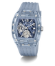 A Guess wristwatch with a translucent light blue case and matching strap, featuring a blue and black marbled dial with silver-tone details.
