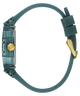 A side profile view of a smartwatch with a translucent teal-green case and a matching teal-green silicone strap, featuring a gold crown button and gold buckle clasp, set against a solid white background.