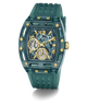 A GUESS wristwatch with a translucent teal-green case and matching textured strap, featuring gold-tone accents, a patterned dial, and two subdials.