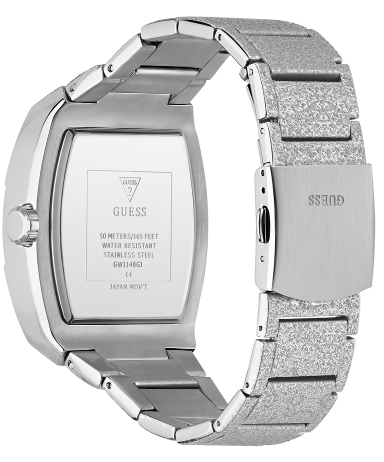 Silver stainless steel watch shown from the back, featuring a rectangular case and a textured metallic link bracelet with the GUESS brand name visible on the clasp and inner case.
