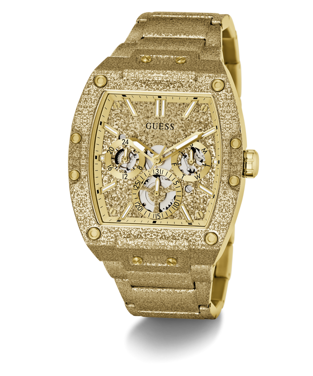 Gold-tone GUESS wristwatch with a textured bezel, crystal-look dial details, and a matching gold-tone link bracelet, shown on a white background.