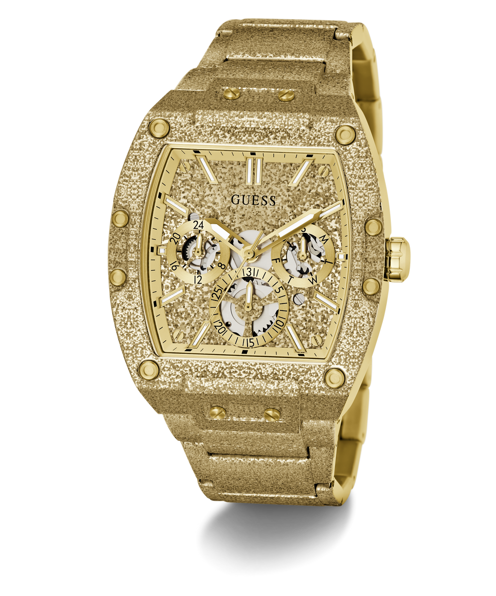 Gold-tone GUESS wristwatch with a textured bezel, crystal-look dial details, and a matching gold-tone link bracelet, shown on a white background.