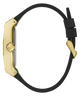 A close-up side view of a smartwatch with a polished gold-tone case and a black silicone strap, set against a solid white background.