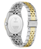 A two-tone stainless steel and gold Guess wristwatch shown from the back, featuring a silver-toned case and a link bracelet with alternating silver and gold segments on a white background.