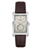 A GUESS men's analog watch featuring a silver-toned rectangular case, a textured champagne dial with a subdial at the 6 o'clock position, and a dark brown alligator-pattern leather strap, shown against a plain white background.