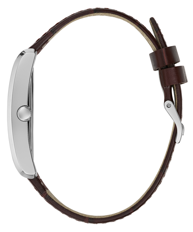 A close-up side view of a watch with a dark brown leather strap and a silver-toned case on a plain white background.