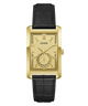 A GUESS men's analog watch featuring a gold-tone rectangular case, a detailed sunburst dial with a small seconds subdial, and a black alligator-textured leather strap, shown against a plain white background.