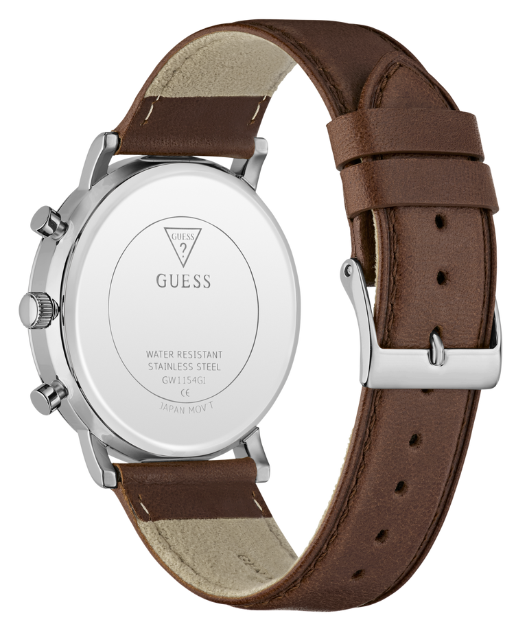 The back view of a GUESS watch with a brown leather strap and a silver stainless steel case, showing the branded backplate.