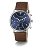 A Guess chronograph watch with a blue dial, silver-tone case, and a brown leather strap, shown on a clean white background.
