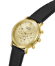 A gold-tone Guess chronograph watch with a black leather strap, shown on a clean white background. lifestyle