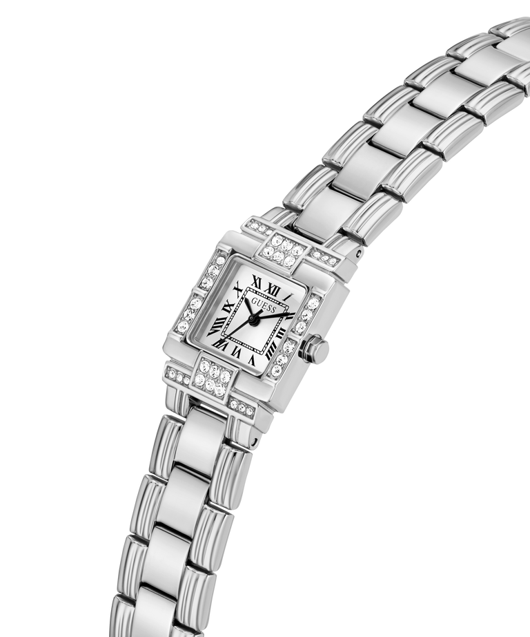 A silver-toned stainless steel women's watch with a rectangular bezel set with clear crystals, Roman numeral hour markers, and a matching metal link bracelet, shown on a plain white background. lifestyle