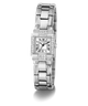 A GUESSS watch with a silver-toned metal link bracelet, a square silver dial with black Roman numerals, and diamond accents, shown on a clean white background.
