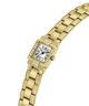 A gold-tone women's watch with a rectangular bezel set with small clear stones, a white dial with black Roman numerals, and a matching gold-tone link bracelet, shown on a plain white background. lifestyle