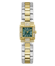 A Guess women's watch featuring a two-tone gold and silver stainless steel link bracelet, a green dial with gold-tone hands and Roman numerals, and diamond accents around the bezel and lugs.