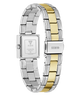A GUESS stainless steel watch with a two-tone link bracelet, shown from the back. The bracelet features alternating polished silver and gold links, and the square case back is visible with the GUESS brand name and 'STAINLESS STEEL' text engraved on it.