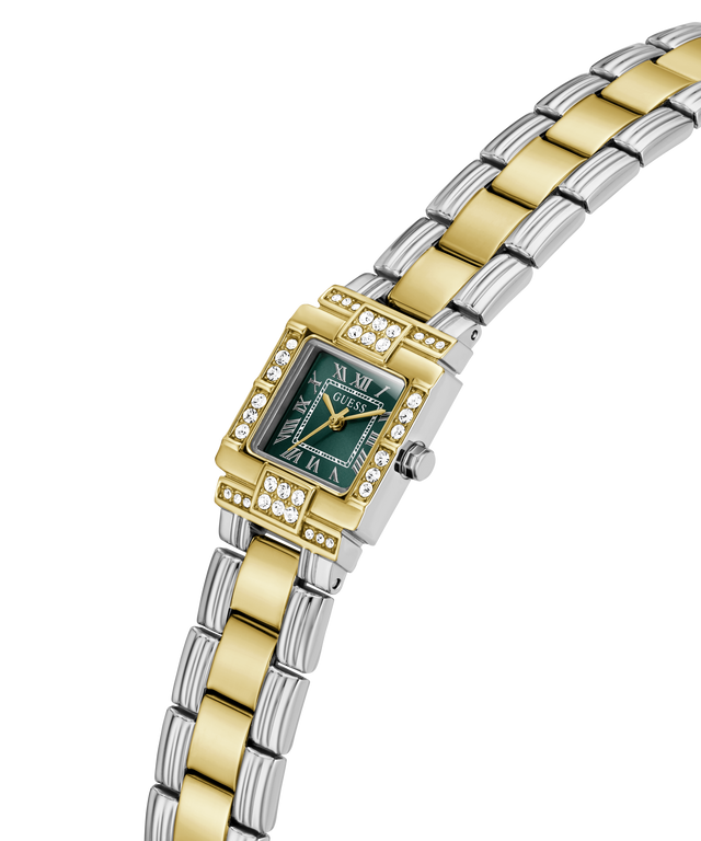 A two-tone watch with a gold and silver link bracelet, a green dial, and a bezel accented with small clear crystals, shown on a plain white background. lifestyle