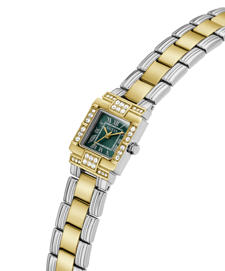 A two-tone watch with a gold and silver link bracelet, a green dial, and a bezel accented with small clear crystals, shown on a plain white background. lifestyle