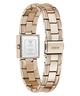 A rose gold stainless steel watch with a square case, shown from the back to display the brand logo and clasp on a solid white background.